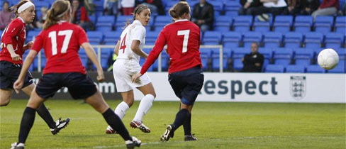 Fara Williams guides the ball home with her left foot.